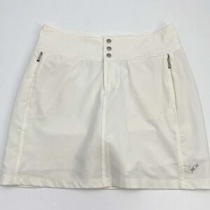 UEC Jofit essential golf skort white size “2” equivalent small tag cut out